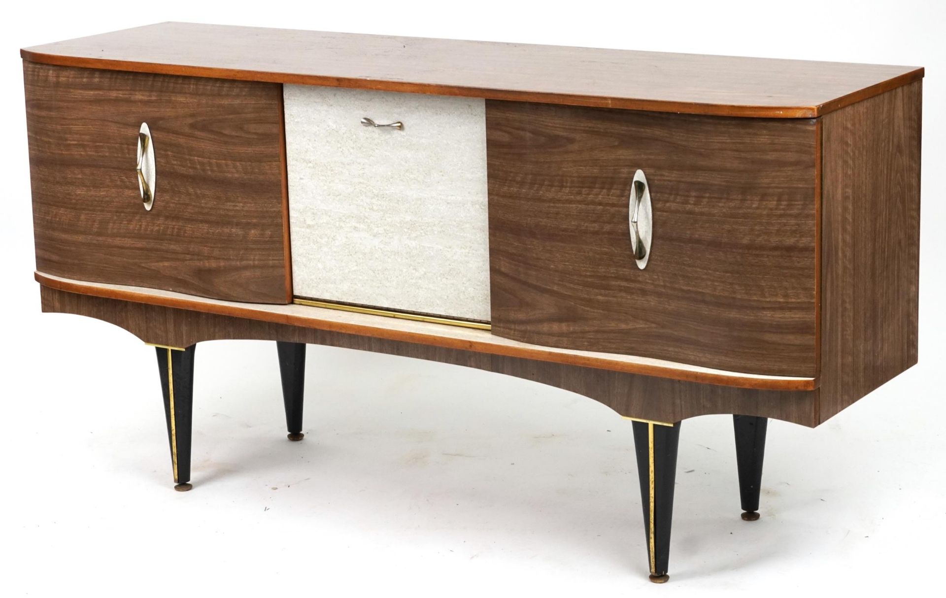 1960s Formica sideboard fitted with three doors, on tapering ebonised legs, 78cm H x 150.5cm W x
