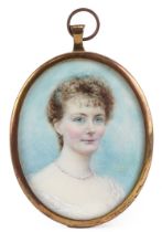 19th/ early 20th century oval hand painted portrait miniature onto ivory of a young female, signed