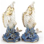 Pair of 19th century continental porcelain scent bottles with stoppers in the form of fish, each
