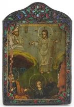 Rectangular Russian icon hand painted with saints housed in an unmarked silver and champleve