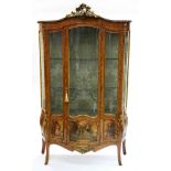 French Louis XV style ormolu mounted kingwood Bombe Vitrine having central glazed doors and side