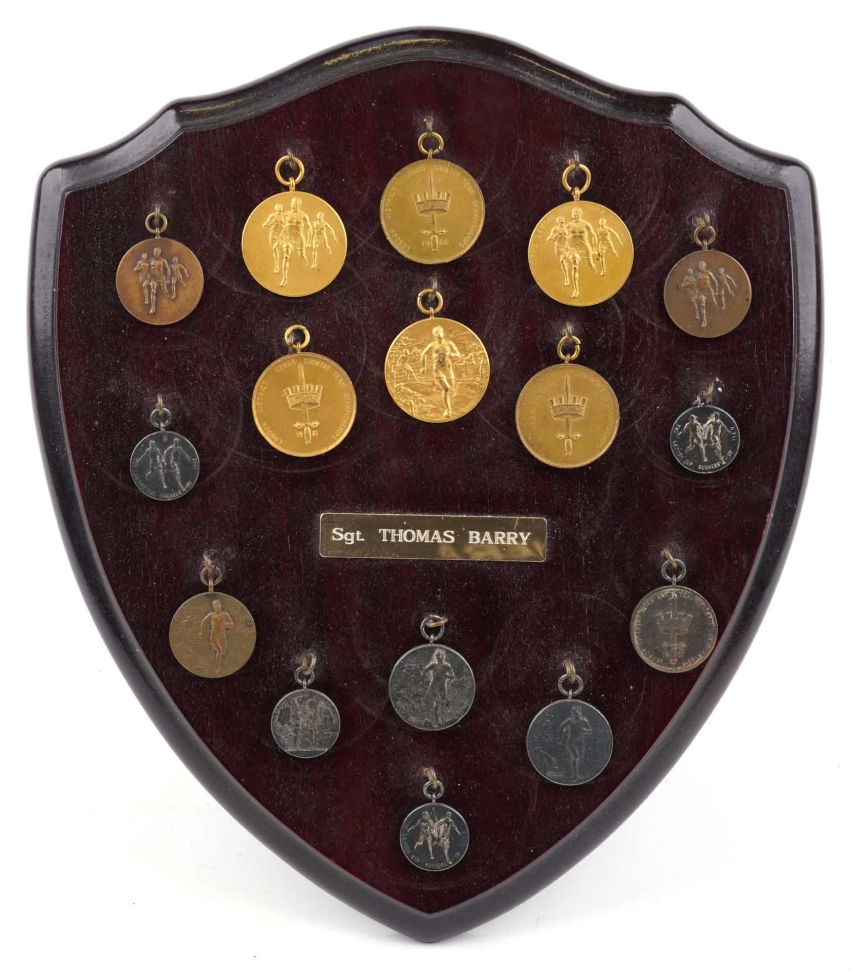 Collection of military interest athletics medals relating to Sergeant Thomas Barry arranged in a