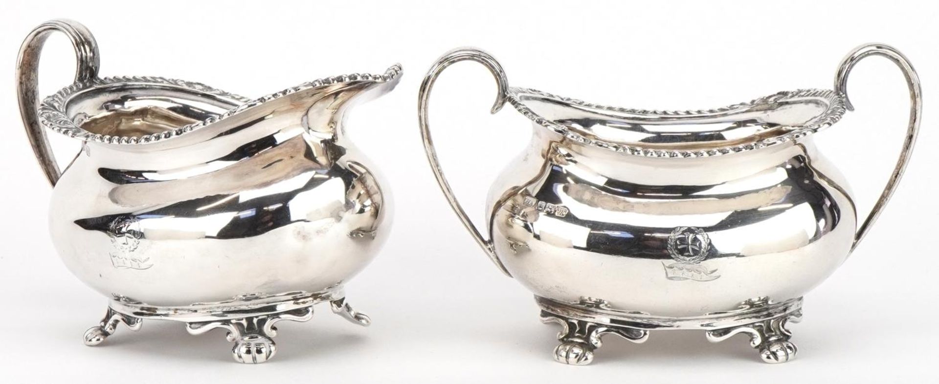 Atkin Brothers, Edwardian silver cream jug and matching sugar bowl with twin handles, the largest