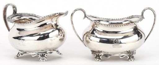 Atkin Brothers, Edwardian silver cream jug and matching sugar bowl with twin handles, the largest