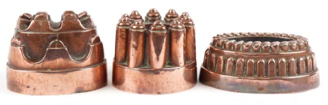 Three Victorian copper jelly moulds including two by Benham & Froud numbered 331 and 615, the