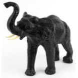 Manner of Liberty & Co, large leather covered elephant, 49cm in length : For further information