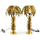 Pair of Hollywood Regency style gilt painted table lamps in the form of palm trees, each 75cm high :