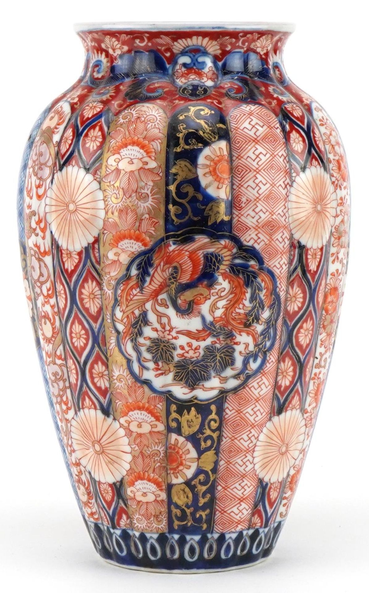 Japanese Imari porcelain fluted vase hand painted with flowers and stylised roundels enclosing - Image 3 of 7