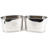 Pair of silvered metal Champagne ice buckets with Napoleon Bonaparte and Lily Bollinger mottos, each