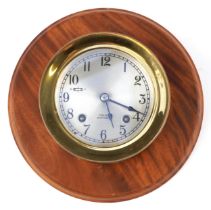 Chelsea ship's bell brass bulkhead design wall clock with hardwood back and related paperwork, the