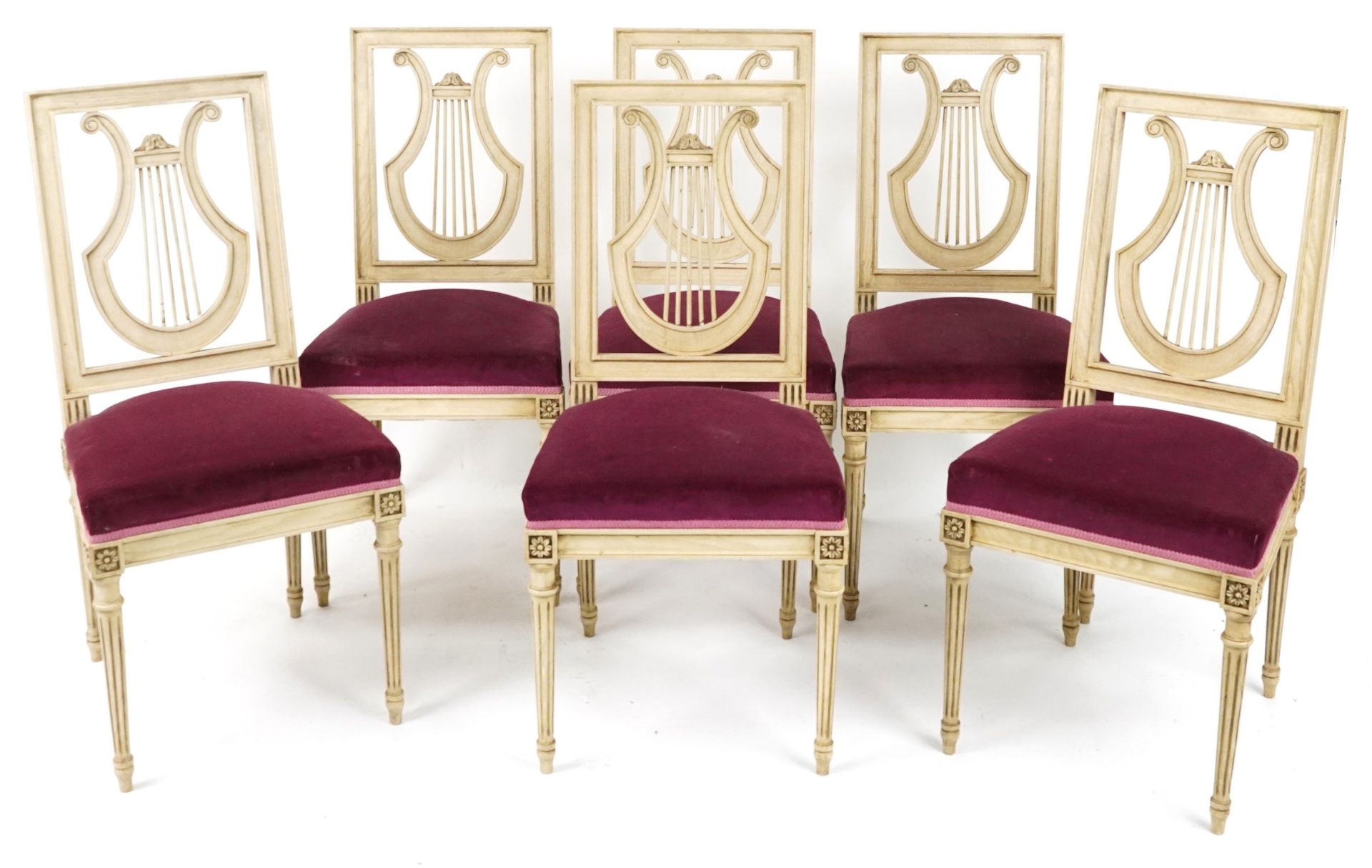 Set of six French cream painted dining chairs with lyre backs, pink upholstered seats on fluted