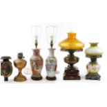 Six lamps including a Chinese porcelain example hand painted in the famille rose palette, carriage