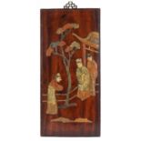 Chinese hardwood panel with soapstone inlay decorated with three figures in a palace setting, 46cm x