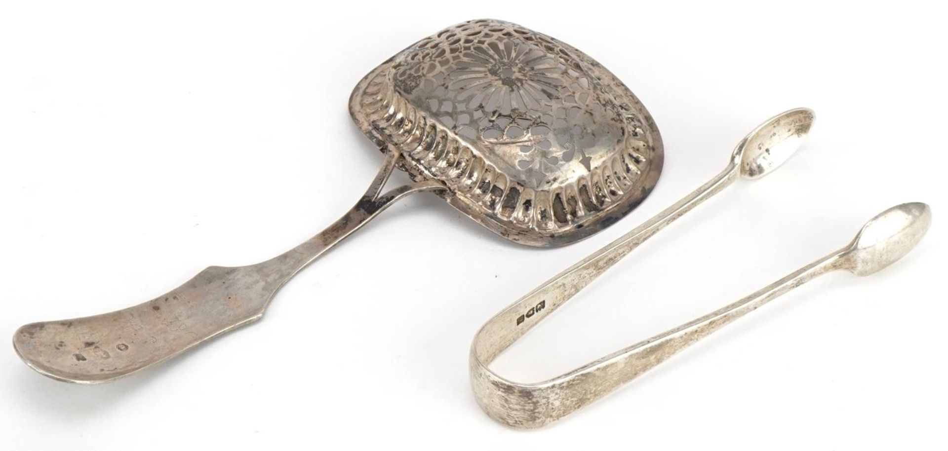 Dutch silver sifting spoon and a pair of silver sugar tongs, the largest 16.5cm in length, total - Image 2 of 4