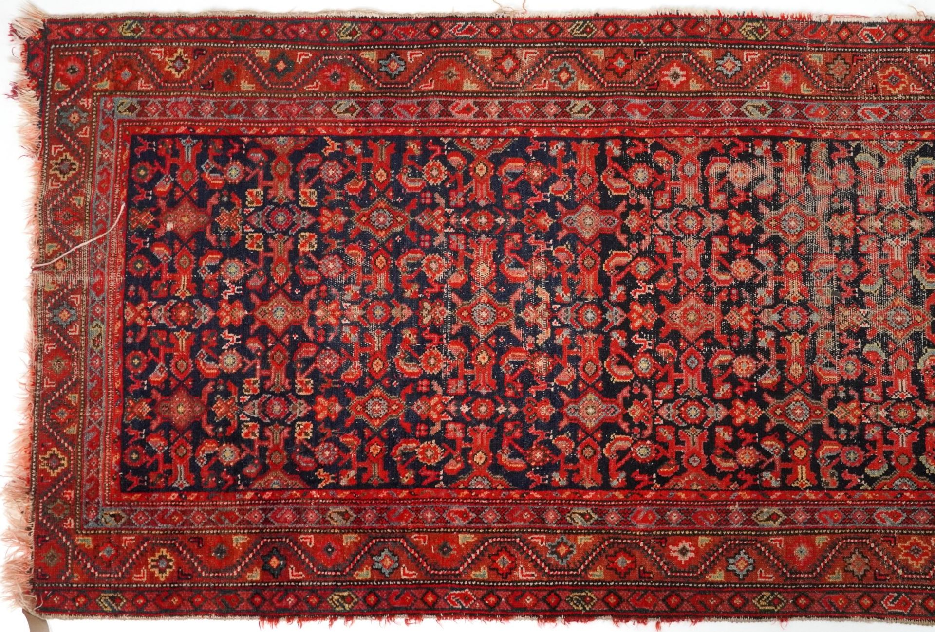 Rectangular Persian red and blue ground carpet runner having an allover floral repeat central field, - Bild 2 aus 6