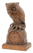 German carved Black Forest hardwood clock case surmounted with an owl, 31cm high : For further