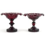 Pair of Bohemian ruby flashed cut glass pedestal bonbon dishes, each 14cm high x 16.5cm in