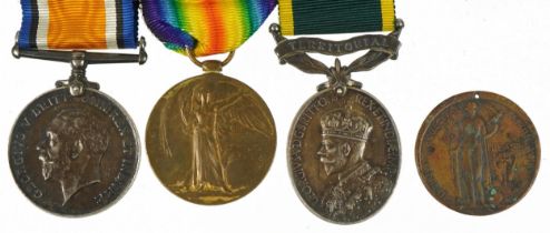 British military World War I three medal group and a peace medallion, the medals comprising World