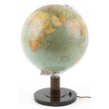 Art Deco Geographia Columbus table globe with silvered arch on circular walnut base, 49.5cm high :