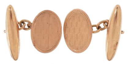 Pair of 9ct rose gold cufflinks, 2.6cm in length, 7.2g : For further information on this lot