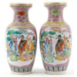 Pair of Chinese porcelain vases decorated with figures and flowers, each 37cm high : For further