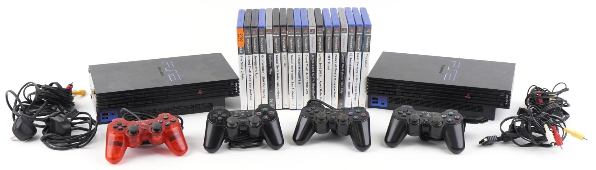 Two Sony PlayStation 2 games consoles with controllers and a collection of games : For further