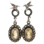 Pair of antique style silver citrine and marcasite drop earrings surmounted with a kingfisher, 3.5cm