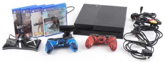 Sony PlayStation 4 games console with controllers, accessories and four games including Call of