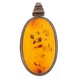 Large silver mounted natural amber pendant, 5.6cm high, 11.0g : For further information on this