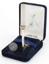 Golfing interest silver tee, propelling pencil and ball marker with fitted case, the pencil 6cm in