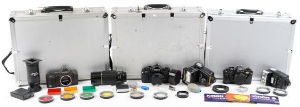 Cameras and accessories in fitted cases including Canon A1W/50mm lens and Canon T70 : For further