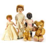 Three vintage dolls including a 28 inch Pedigree example and two golden teddy bears with jointed