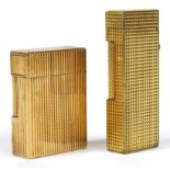 Two gold plated pocket lighters comprising S J Dupont with box and Dunhill : For further information