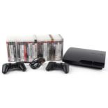 Sony PlayStation 3 games console with two controllers and a collection of games : For further