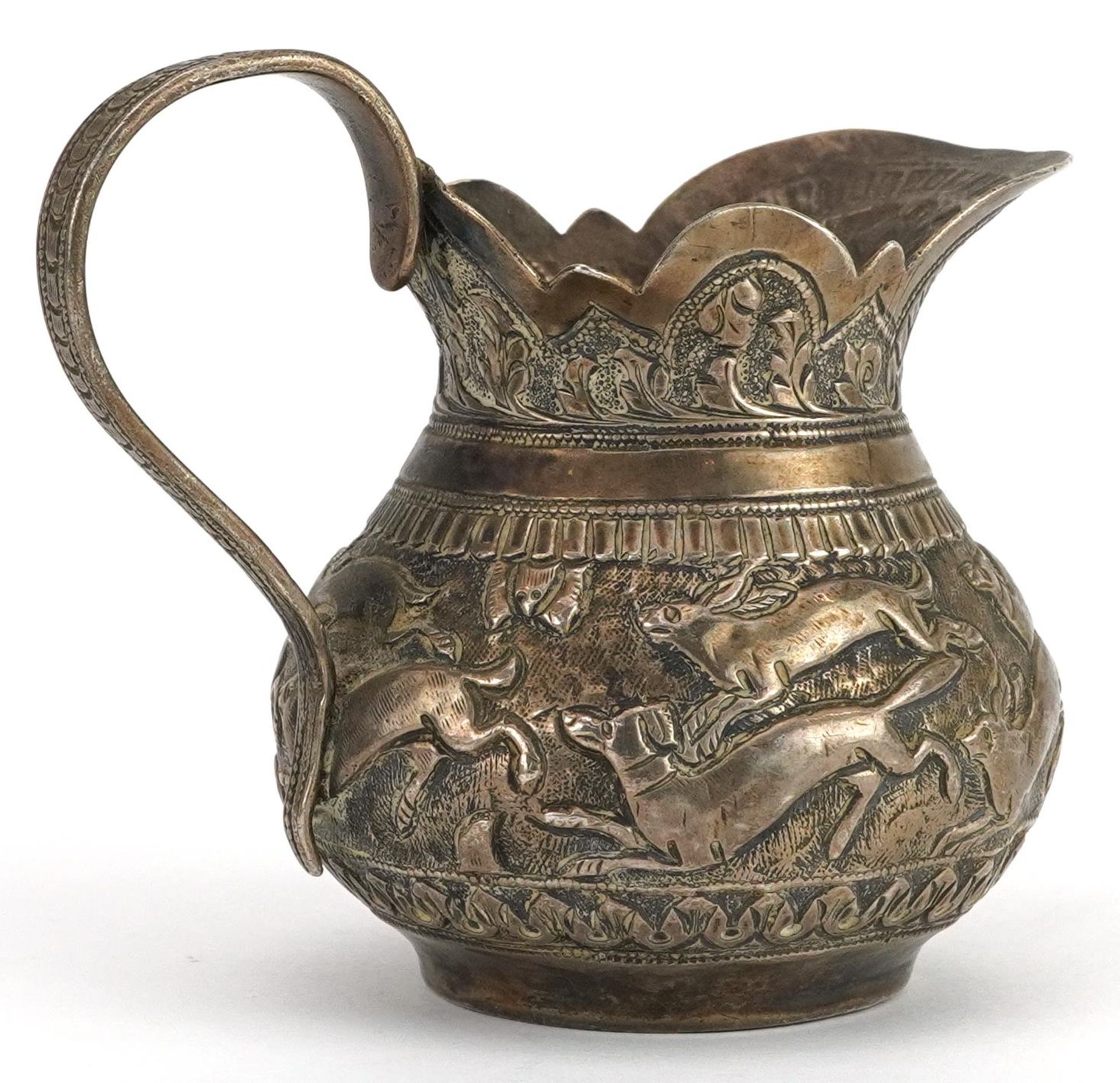 Anglo Indian unmarked silver cream jug embossed with wild animals, 7cm high, 101.8g : For further - Bild 2 aus 3