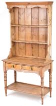 Victorian slim stripped pine dresser with open plate rack above two frieze drawers and under tier,