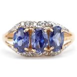 9ct gold tanzanite and diamond ring with split shoulders, size M, 1.4g : For further information