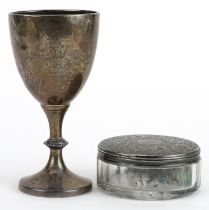 George V silver trophy and a Victorian circular glass jar with silver lid, the largest 12.5cm