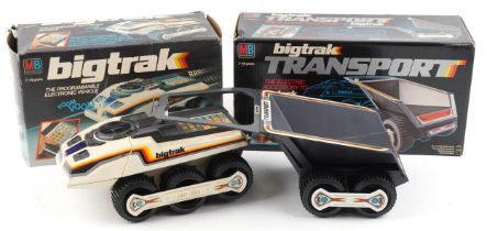 Two vintage Bigtrak computer activated vehicles with boxes, numbered 4955 and 4956 : For further