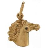 9ct gold horse head charm, 1.5cm high, 0.8g : For further information on this lot please visit