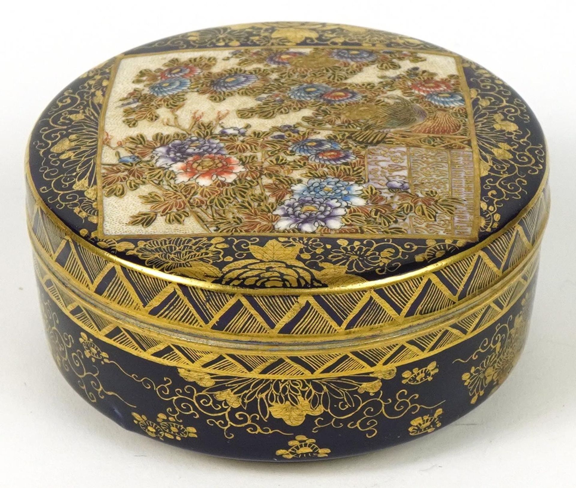 Japanese Satsuma pottery blue ground box and cover hand painted with flowers, character marks to the