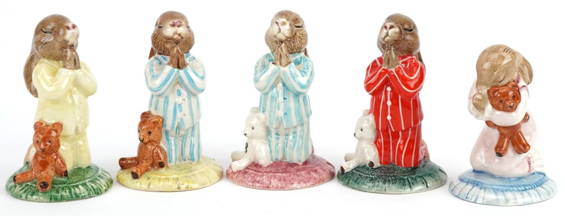 Five Royal Doulton Bunnykins figures comprising four Bedtime Bunnykins and Goodnight Bunnykins,