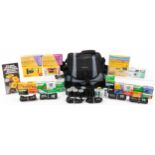 Collection of expired professional 35mm and 120 film and disposable cameras including Portra,