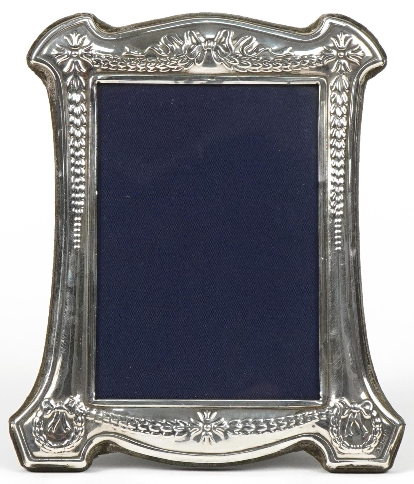 Carrs, Elizabeth II silver easel photo frame embossed with swags and flowers, Sheffield 1995, 18cm x