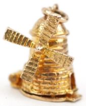 9ct gold opening windmill charm, 1.4cm high, 2.7g : For further information on this lot please visit