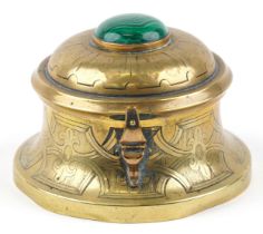 Victorian Gothic brass inkwell with glass liner having hinged lid with malachite cabochon,