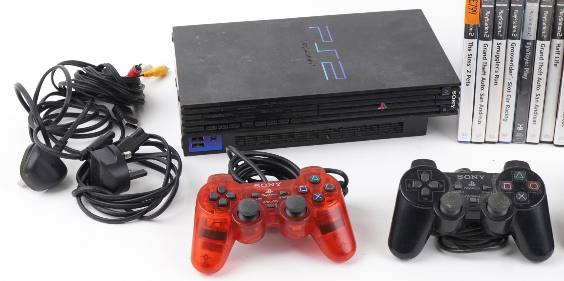 Two Sony PlayStation 2 games consoles with controllers and a collection of games : For further - Image 2 of 4