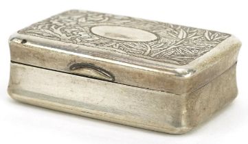 Chinese export silver pillbox, the hinged lid embossed with bamboo grove, MK maker's mark, 4cm wide,