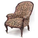 Victorian mahogany arm chair with floral upholstery and serpentine front, 90cm high : For further