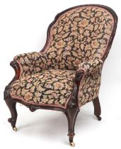 Victorian mahogany arm chair with floral upholstery and serpentine front, 90cm high : For further